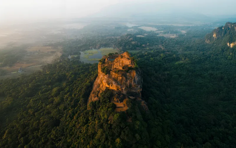 Cinematic Bird's Eye View of Lion Rock Citadel – High Resolution Laptop Wallpaper
