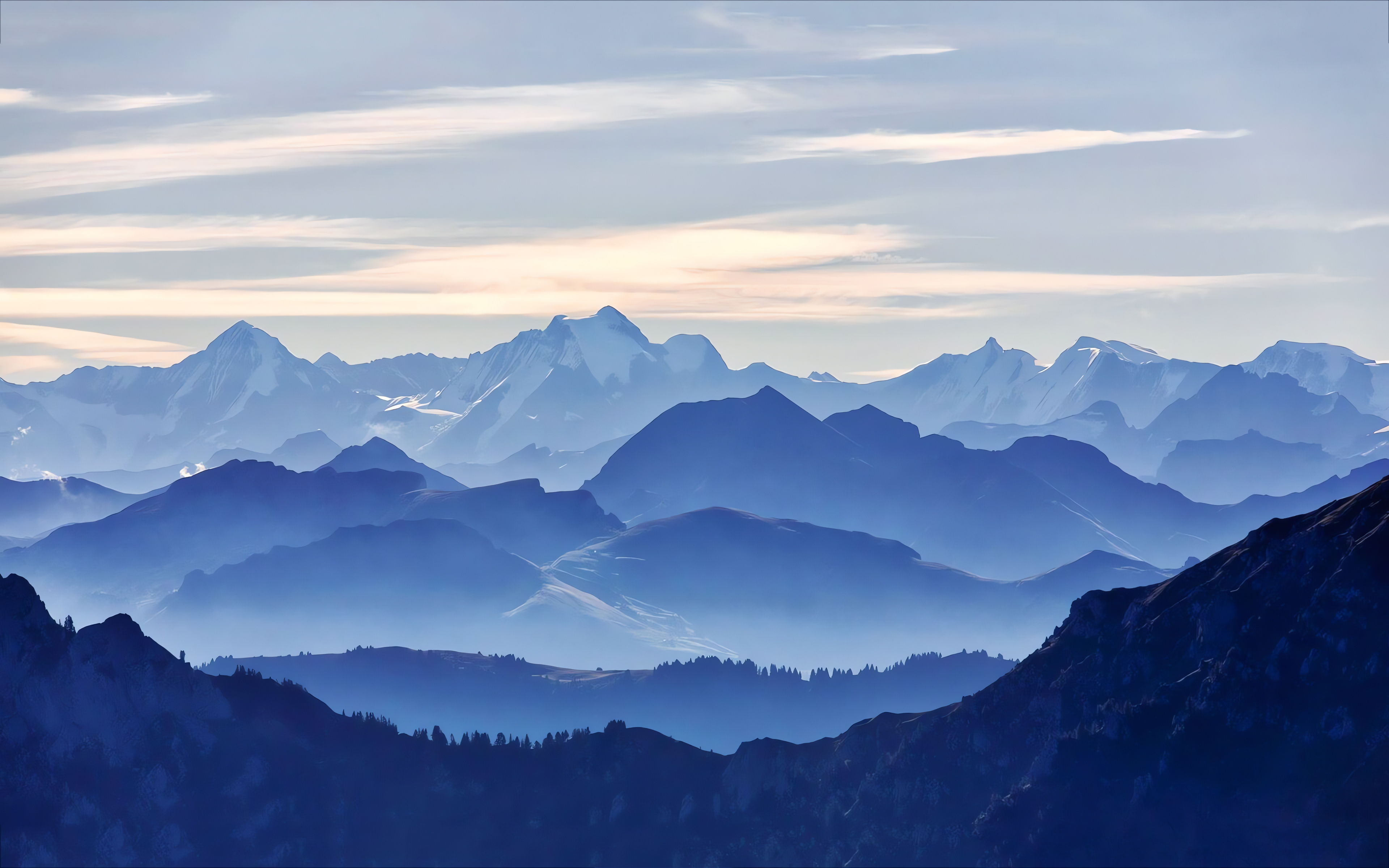 Beautiful Layered Mountain Peaks in Fog – Panoramic Landscape Laptop Wallpaper