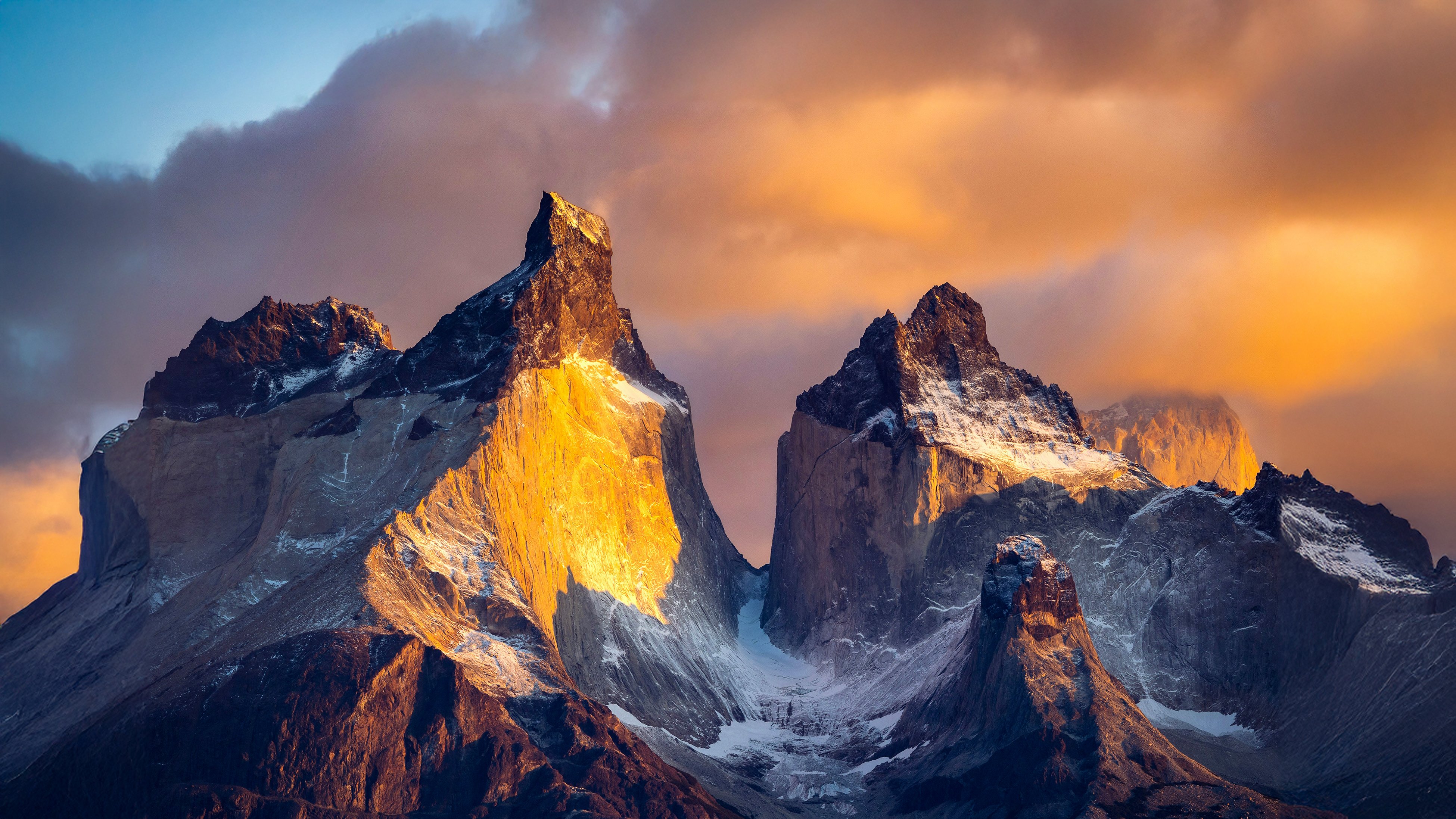 Beautiful Snow-Capped Patagonian Ridge and Orange Clouds – High Resolution Laptop Wallpaper