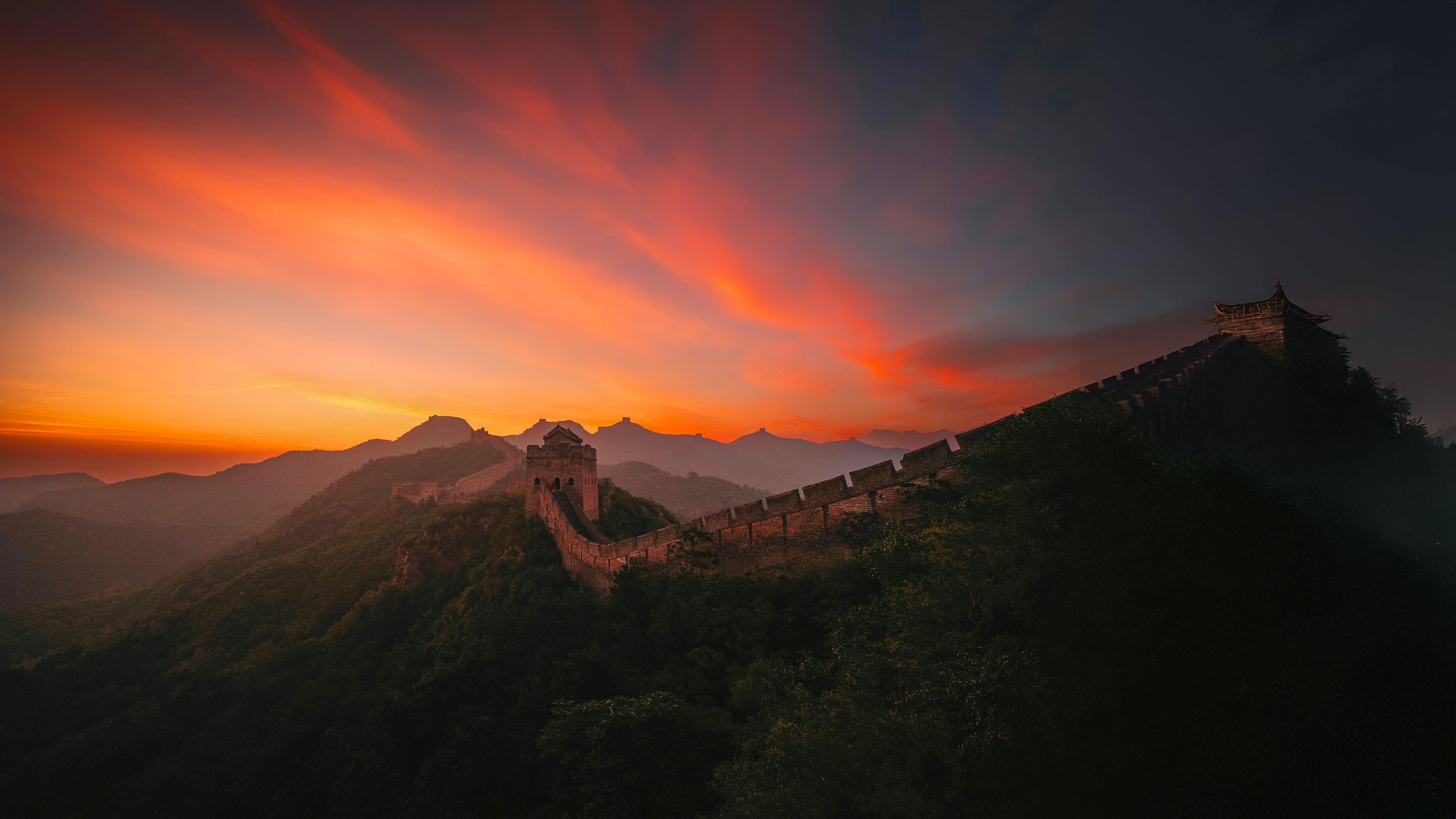 Majestic Historic Landmark with Vibrant Orange Sky – Clean Laptop Wallpaper